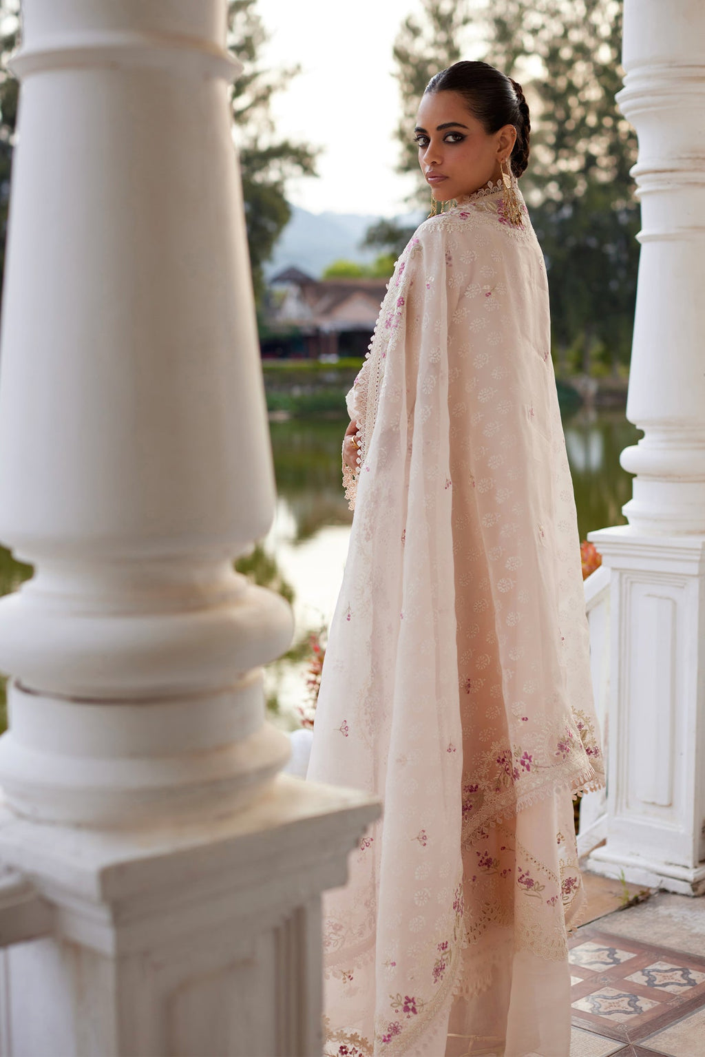 Melina pink kurta detail view showing curved hem embroidery - Saad Bin Shahzad
